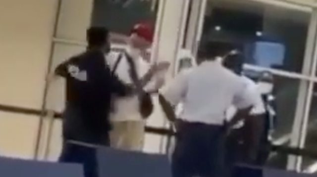Cop Smacks Fire Out Off Rowdy Man At Airport!