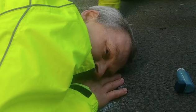 Doing The Most: Climate Change Activist Glued His Face To The Road!