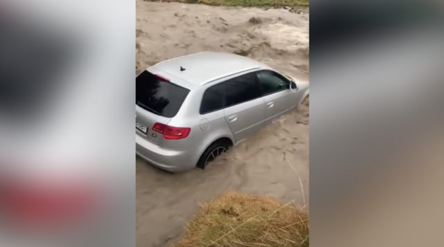 Epic Fail: Guy Attempts To Cross A River In His Car, Instantly Realizes He Made A Huge Mistake!