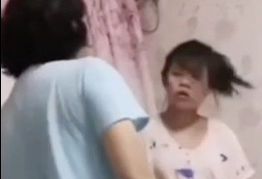SMH: Woman Slaps Her Daughter Around After Finding Out She Was Talking To Grown Men Via Social Media!