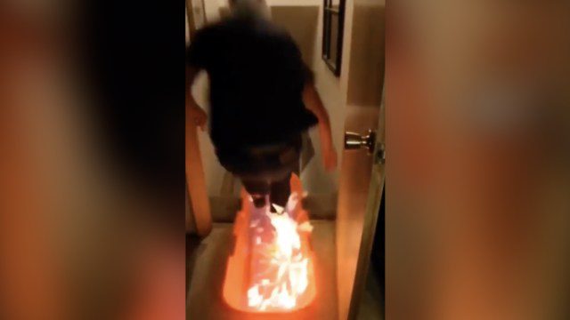 What Could Go Wrong? Man Jumps Into Burning Sled And Rides It Down Flight Of Stairs!