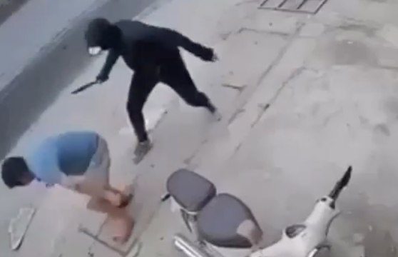 WTF: Dude With A Machete Strikes At A Man's Foot Leaving Him Bloody! (*Warning* Graphic)