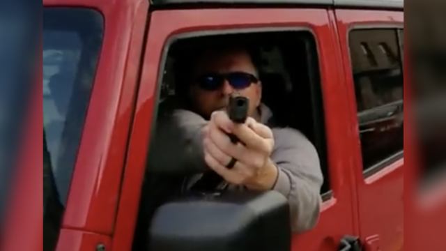 Driver Points Gun At Man During Road Rage Incident In Illinois!