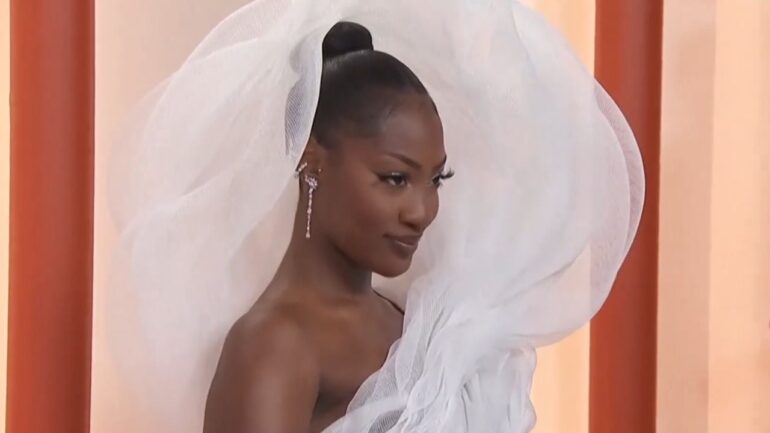 Tems “Steals” Show With Oversized Dress