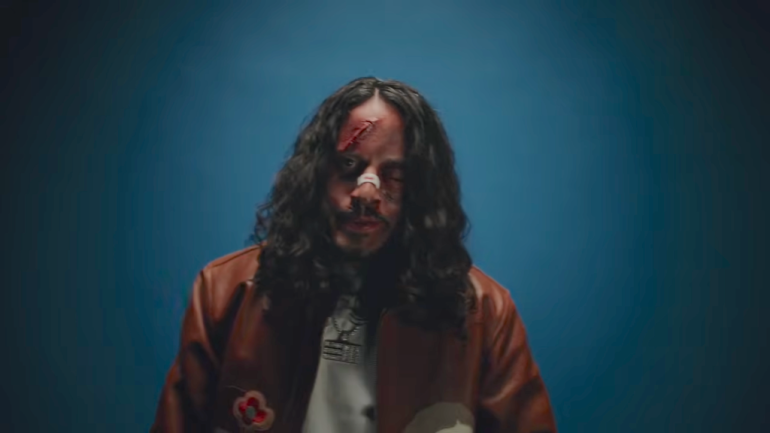 Russ’ ‘Pent Up In A Penthouse’ Video: Grisly Injuries