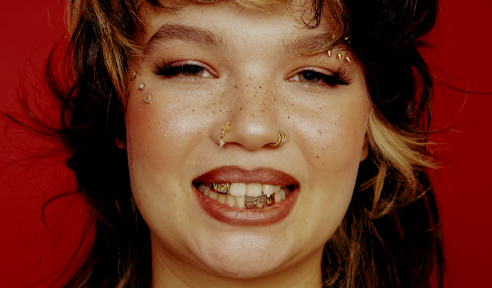 Lola Young’s ‘One Thing’ Video Packs A Major Punch