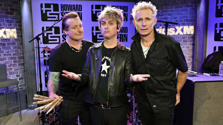 Green Day Kicked A Fan Off Stage For Playing Oasis